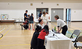 Families ask questions of representatives from the clubs, teams and organizations at this year’s Recreation and Leisure Showcase.    Andre Gomelyuk / Bulletin Photo