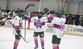 Sioux Lookout Bombers Assistant Captain Ty Love (left) is congratulated by his teammates on his 3rd period goal against the Thunder Bay North Stars on Nov. 22. The goal would prove to be the game winner.    Tim Brody / Bulletin Photo