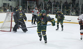 Bombers Defenseman Josh Greene races for the puck.    Tim Brody / Bulletin Photo