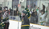 Bombers forward Owen Cotter, and Bombers fans at the Hangar, celebrates his third period goal.     Tim Brody / Bulletin Photo