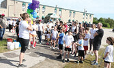 More than 40 participants took part in the Family Fun Colour Run along the Umfreville Trail. The run began at the Forest Inn and Conference Centre.   Tim Brody / Bulletin Photo 