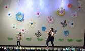 ONYX Dance & Fitness Studio Director Manuela Michelizzi (right) and her daughter Emilia perform a routine in honour of Constable Cosimo Racco. - Tim Brody / Bulletin Photo