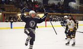 Former Sioux North High School Warrior Cortez Favot celebrates after extending the Ice Dogs lead to 2-0 in the first period. - Jesse Bonello / Bulletin Photos