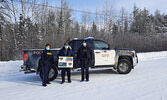 North Caribou Lake First Nation Councillor Raymond Adams (centre) is joined by constables Leann Shakakeesic (left) and Jeffrey Belmore in promoting this year’s Festive RIDE campaign.      Photo courtesy Ontario Provincial Police