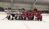 Local police officers (wearing white) and firefighters (wearing red) faced off in a charity hockey game at the Sioux Lookout Memorial Arena on March 7. The game was held in memory of Michael Gervasi, a Sioux Lookout firefighter who passed away last year. 