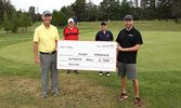 Sioux Lookout Golf and Curling club interim manager Dylan Harp (front, right) presents Dwight Hildebrand (front, left) with a cheque for $10,000 for sinking a hole-in-one on Hole #4 during the Men’s Twilight on July 15. Accompanying Hildebrand in the phot