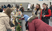 Visitors to the Holly Jolly Festival were able to browse a market, take in a variety of beautifully decorated Christmas Trees, as well as visit with Santa Claus.     Tim Brody / Bulletin Photo