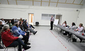 Brian P. MacKinnon, Municipal Manager of Corporate Services/ Municipal Clerk (standing) addresses Hudson residents.   Tim Brody / Bulletin Photo