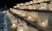 Ice candles glow softly in the night during last year’s Ice Candle Memorial service.   Bulletin File Photo