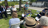 Cornerstone Christian Fellowship representative Nate Hochstetler leads those gathered at the event in song.     Tim Brody / Bulletin Photo