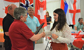 Michelle Serena Von Arx (right) received certificates to mark the completion of the Rotary Canoe Trip from Rotary Club of Sioux Lookout member Susan Barclay (left). - Jesse Bonello / Bulletin Photos