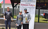 Cooper (left) and Kevin LaBelle collect their second place prize in the 11-17 division, with a total weight of 7.04 pounds. - Jesse Bonello / Bulletin Photos