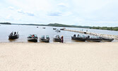 Teams bring their catches to the weigh station at the town beach.    Tim Brody / Bulletin Photo 