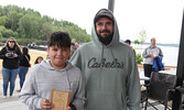 The 10 and under division first place team of Jaxson Labelle (left) and Mike Labelle.   Tim Brody / Bulletin Photo