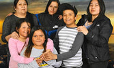 Top row, left to right: Geraldine Chapman (mother, age 47), Angel McKay (age 12), Karl Cutfeet (age nine), Thyra Chapman (surviving, age 19).  Bottom row, left to right: Hailey Chapman (age seven), Shyra Chapman (age six). - Kitchenuhmaykoosib Inninuwug F