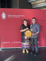 NAN Grand Chief Alvin Fiddler (right) congratulates Norma Kejick of Lac Seul First Nation, winner of the Emile Nakogee Award for Outstanding Leadership.     Tim Brody / Bulletin Photo