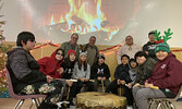 Waninitawingaang Memorial School grades six, seven, and eight students performed traditional drumming and singing on the school’s drum during their Christmas concert on Dec. 19. - Alisha Hill / Submitted Photo