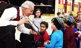 Canadian icon Al Simmons shows his Juno Award to audience members during his performance in Sioux Lookout in 2017. - Bulletin File Photo