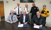 Representatives from the Municipality of Sioux Lookout and Independent First Nations Alliance pose for a group photo following the signing of the MoU. Front row from left: Municipal Chief Administrative Officer & Municipal Clerk Brian P. MacKinnon, Sioux 