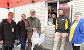 Standing from left: SLMHCF Donor Relations/Operations Coordinator Melissa Slade, Sioux Lookout Home Hardware HR Manager Melissa Bortlis, customer Bob Wood, Karamjeet (Kam) Singh, regional manager for the Forest Inn & Conference Centre and Sunset Suites, a