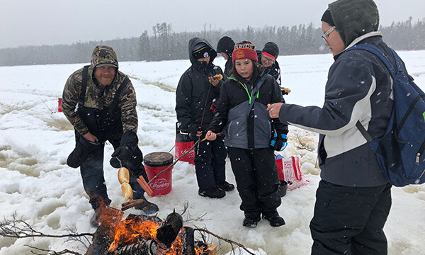 SMPS students enjoy ice fishing during March Break