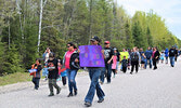 Many participants marched with homemade banners and signs promoting sobriety and healthy living during the March To Wellness. - Jesse Bonello / Bulletin Photo