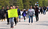 Lac Seul First Nation elementary students walked in solidarity with community leadership, members and elders to promote sober and healthy living. - Jesse Bonello / Bulletin Photo