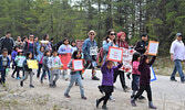 Many participants marched with homemade banners and signs promoting sobriety and healthy living during the March To Wellness. - Jesse Bonello / Bulletin Photo