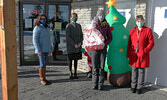 From left: Chamber executive member Holly Cosco, Chamber Executive Assistant Kayleigh Bates, Moonlight Madness draw winner Jenny DeRusha and Chamber executive member Dori Hopko. - Tim Brody / Bulletin Photo