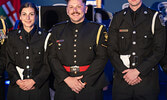 From the left: Cst.Gina White, Cst. Dylan Vickruck, and Cst. Kienan Shortt, represent the Fort Hope detachment team as they receive their Investigation of the Year Award Thursday during the NAPS Awards and Service Recognition Ceremony in Thunder Bay, Ont.