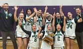 The Sioux North High School Senior Girls Basketball Team. Back row from left: Assistant Coach Michael Kreisz, Sophia DeRusha, Karla Cutfeet, Honey Necan, Tara McClure, Gianna Carnochan, Lynn McClure, and Head Coach Shawn Hordy. Front row from left: Nellie