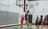The Sioux Lookout Warriors in action against the Westgate Collegiate and Vocational Institute Tigers in Game 1 of the NWOSSA AA Senior Boys Basketball Championship held at SNHS.     Tim Brody / Bulletin Photo