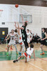 The Sioux North High School Senior Boys Basketball Team (the Warriors) in action against the visiting Westgate Collegiate and Vocational Institute Senior Boys Basketball Team (the Tigers) in game two of the NWOSSA “AA” Basketball Championship.  Tim Brody 