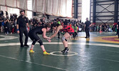 Omi Sakamoto (wrestler on left) in action at OFSAA.   Tim Brody / Bulletin Photo