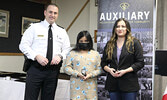 OPP North West Region Chief Superintendent/Regional Commander Bryan MacKillop presents Leandra McKay (centre) and Chanelle Skunk (right) with the Commissioner’s Citation for Bravery.   Tim Brody / Bulletin Photo