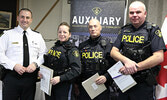 From left: OPP North West Region Chief Superintendent/Regional Commander Bryan MacKillop presents 20 year exemplary service medals to Provincial Constable Natalia Gauthier, Sergeant Jean Duguay, and Sergeant Kevin Young. Missing from photo is Sergeant And