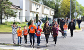 Suzie Hughdie (orange shirt, middle) led students from both SMPS and SNHS during their Orange Shirt Day walk. - Jesse Bonello / Bulletin Photos