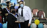Sara Meekis receives her diploma from PFFNHS Principal Darrin Head.   Tim Brody / Bulletin Photo