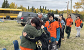 Pelican Falls First Nations High School students comfort and thank elders from Lac Seul First Nation who shared their residential school stories with them. Tim Brody / Bulletin Photo