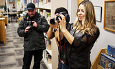 Digital Creator Program Lead Sarah Fraser (right) taking part in a Sioux Lookout Photography Club workshop at the Sioux Lookout Public Library. - Photography Club / Submitted Photos