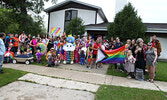 LGBTQ2S+ Pride Celebration Parade participants pose for a group photo.    Tim Brody / Bulletin Photo