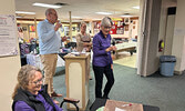 Home Hardware Skip to Equip Classic committee members Muriel Anderson (holding microphone) and Vera Kameda-Lacroix (seated) talk to event participants about the ladies curling event, which is a fundraiser for the Sioux Lookout Meno Ya Win Health Centre Fo