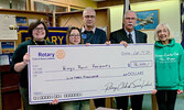 Pictured from left: Holly Szumowski - SNHS, Nanie Thongtouhmok - Rotary Exchange Student from Thailand, Andreas Kottschoth - Rotary Sioux Lookout President, Rob McClendon - Sioux Lookout Meno Ya Win Foundation, Joan Dykes - PAWS. Photo courtesy of the R