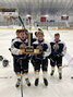 Teammates Aiden Kelly (left), Brooks Atwood (centre), and Vander Houtz (right) proudly display their team’s trophy from the Lake of the Woods U11 Hockey Tournament. Karla Madsen / Submitted Photo