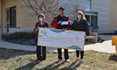 Ralph A. Raspado (centre) holding his winning cheque, presented by SLMHC Foundation Treasurer Rita Demetzer (left) and SLMHC Foundation Chair Christine Hoey (right).      Reeti Meenakshi Rohilla / Bulletin Photo