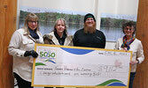 From left: SLMHC Foundation President Christine Hoey, draw winners Tammy Perreault and Eric Ingram, and SLMHC Foundation Treasurer Rita Demetzer.   Tim Brody / Bulletin Photo