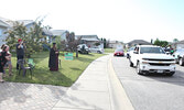 Graduate Abigail Harder and her family take in the procession.     Tim Brody / Bulletin Photo