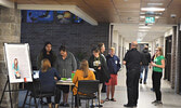 Visitors were greeted just inside the front doors where they were offered tours of the school as well as assistance finding specific classrooms and teachers. - Jesse Bonello / Bulletin Photo