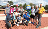 Bocce tournament winners with Blueberry Bert. Back from left: Elizabeth Sequin, Ruth Bellingham, Dick McIntyre, Georgina Cesiumas, Blueberry Bert, Deb Durante, Frank Durante, and Lawrance Durante. Kneeling from left: Laurie Jefferson, Cindy Henrickson Ran