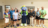 Seniors pickleball participants with Blueberry Bert, from left: Charron Sippola, John Rankin, Debbie Whalen, Clayton Bye, Suzanne Rankin, Bluberry Bert, Linda Brant, Carolyn Linquist, Claudette Richard, Lisa Larsh and James Mansfield. - Tim Brody / Bullet